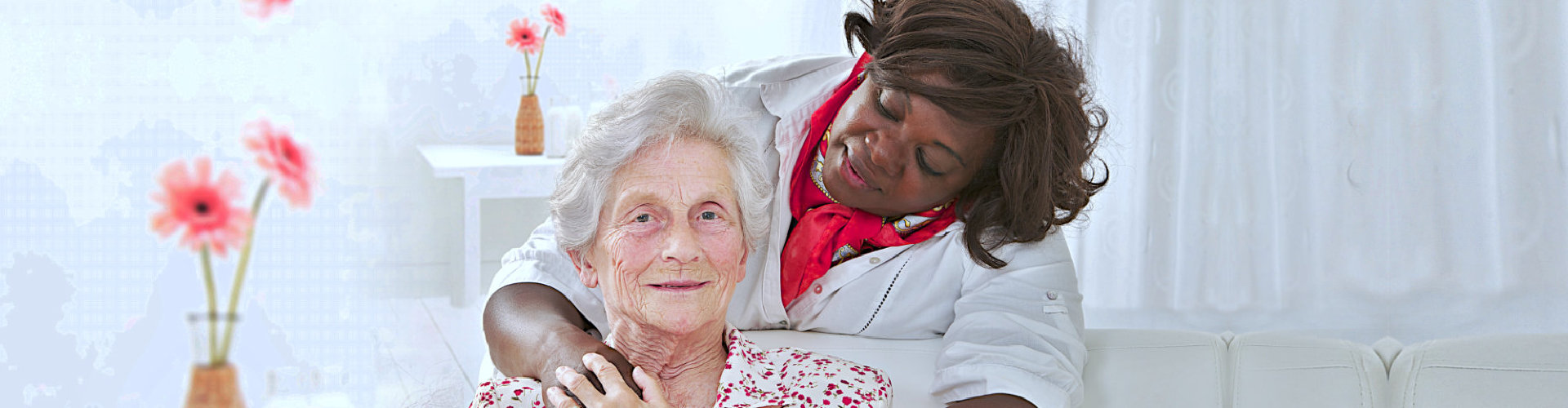 smiling caregiver and senior woman